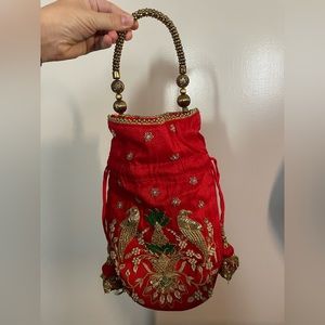 Indian red clutch bag